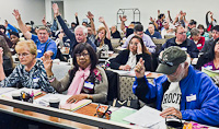 Tenant leaders raise hands to testify on bullying where they live
