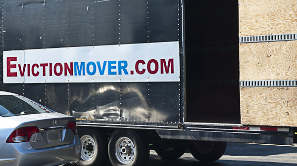 Truck with sign "EvictionMover.com"