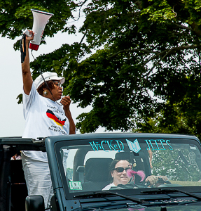 Doreen Wade calls out to onlookers during parade opening Negro Election Day