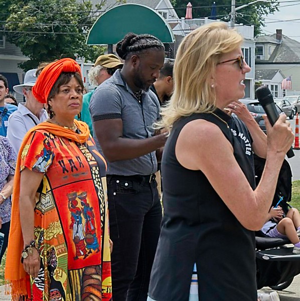 Doreen Wade listens as Senator Joan B. Lovely speaks.