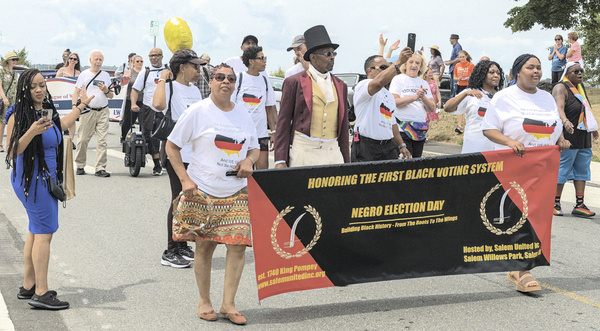 "King Pompey" marches in parade opening Negro Election Day at Salem Willows