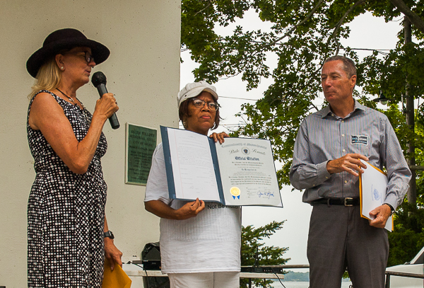 Senator Joan B. Lovely (Left) and Representative Paul Tucker (Right) Present Proclamation to Doreen Wade (center)