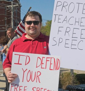 man holding signs