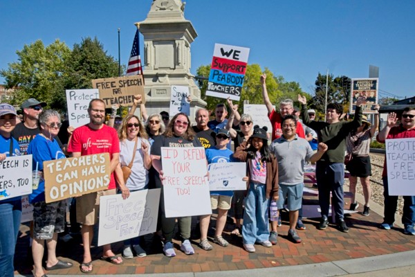 large group with signs