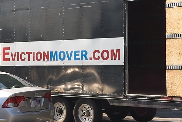 Eviction mover, sign on truck